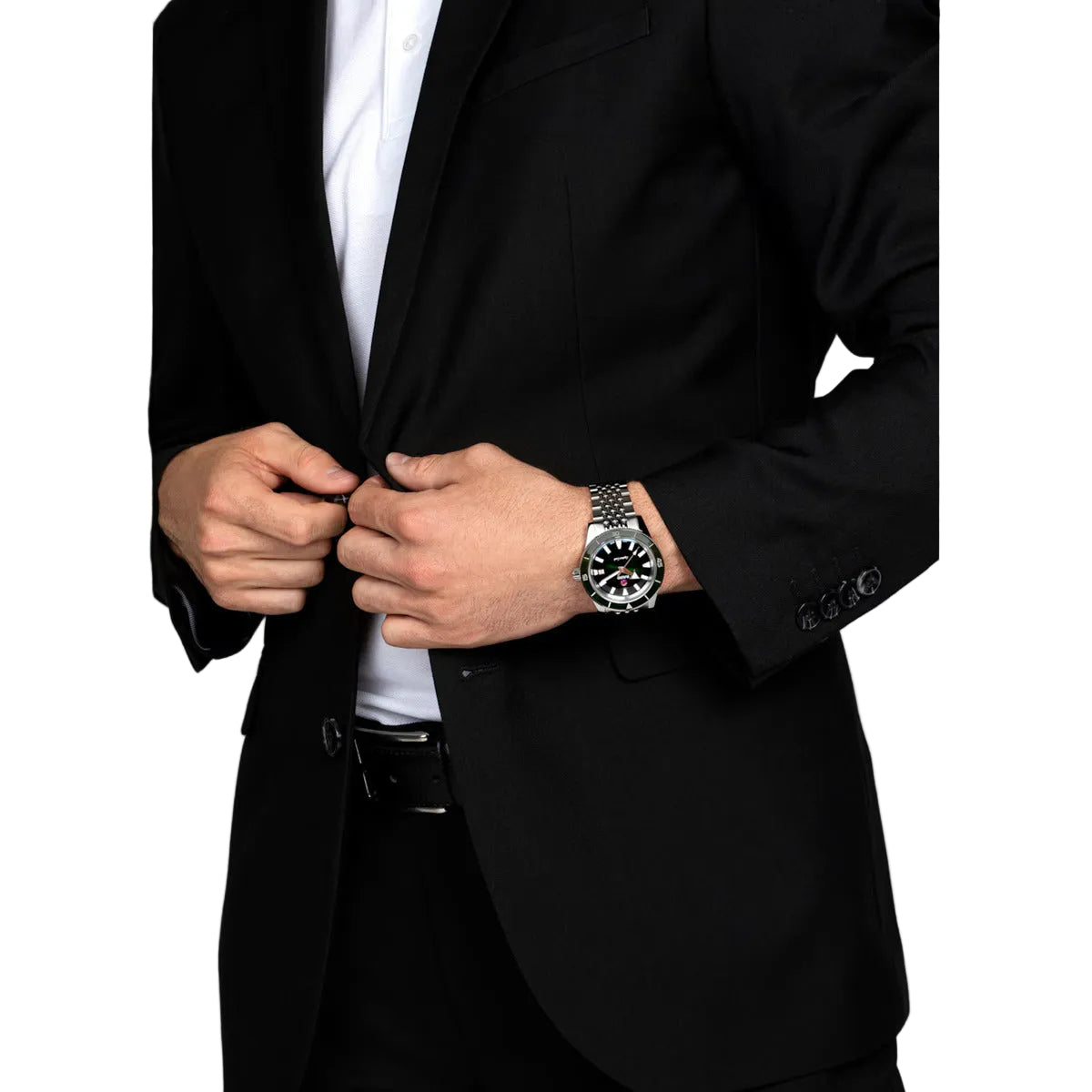 Person wearing a black suit and silver watch on a plain background
