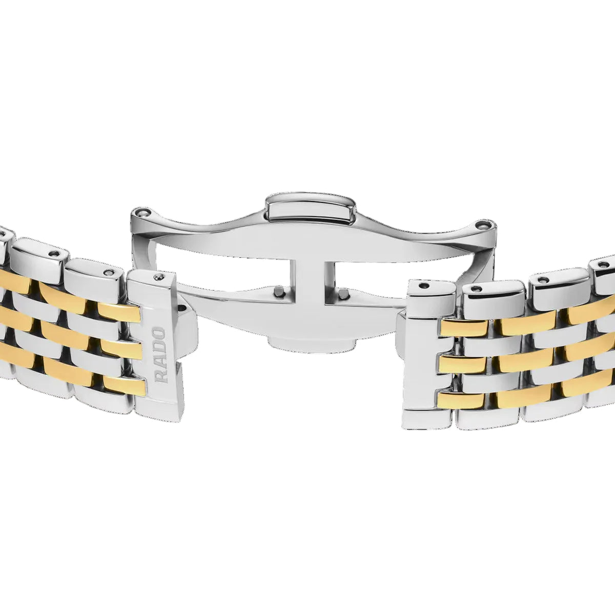 Two-tone silver and gold watch bracelet on a black background
