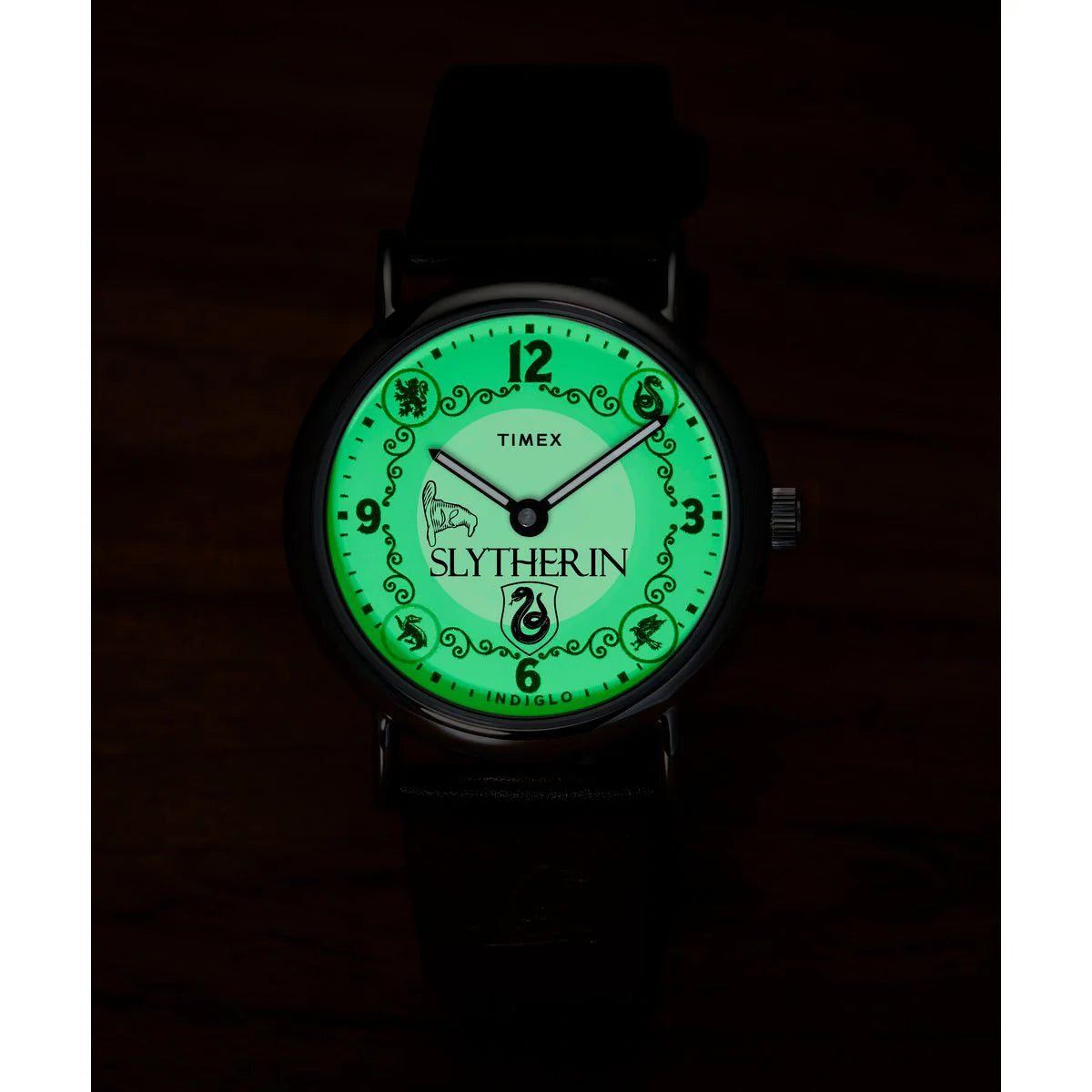 Timex watch with Slytherin design on a dark background