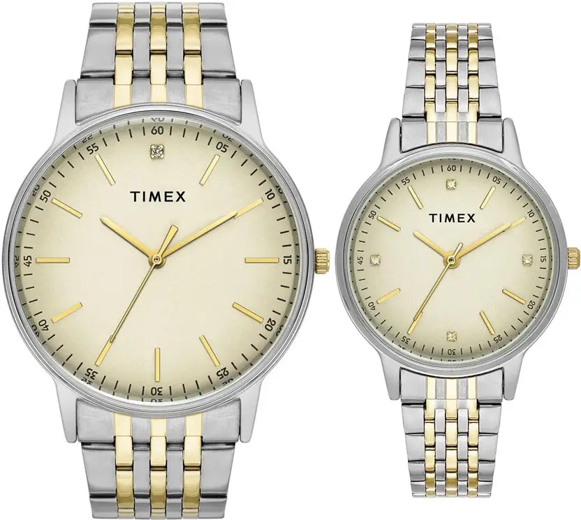 Two Timex watches with silver and gold two-tone bands on a white background