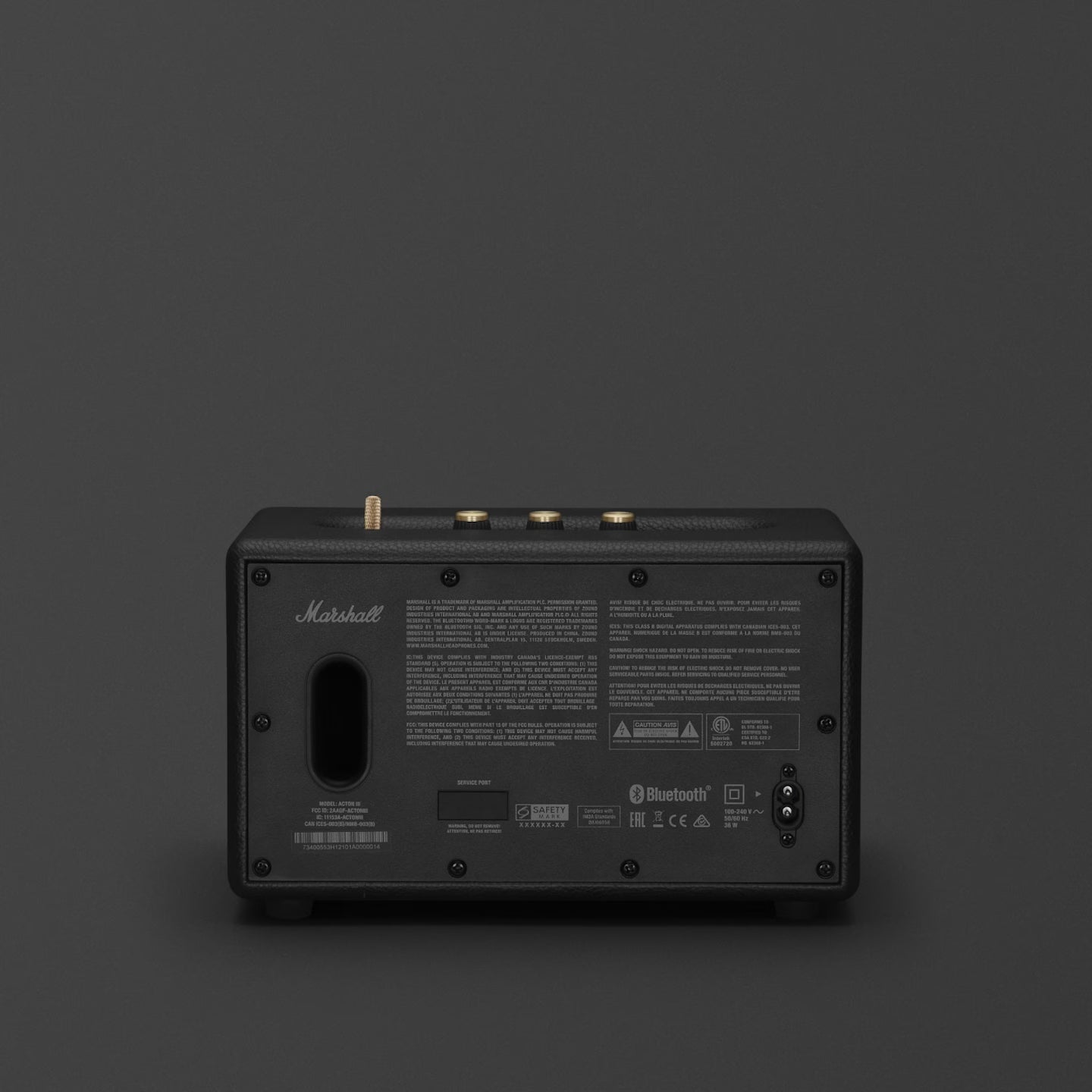 Back view of a Marshall amplifier on a dark background