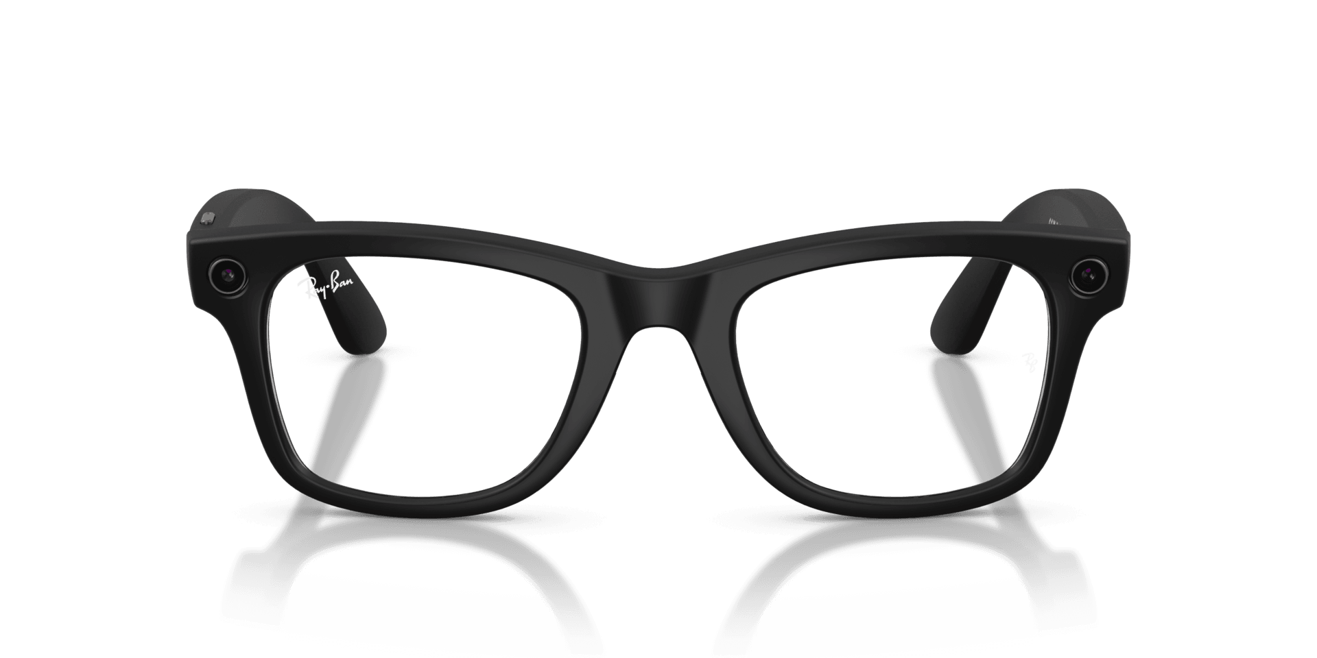 Black glasses on a reflective surface with a dark green background