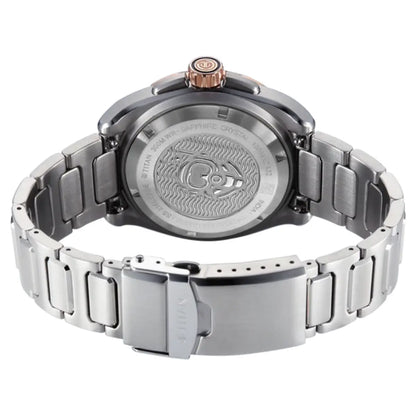 The back view of a stainless steel watch with a matching metal link bracelet, featuring a rose gold crown accent and engraved details on the case back.