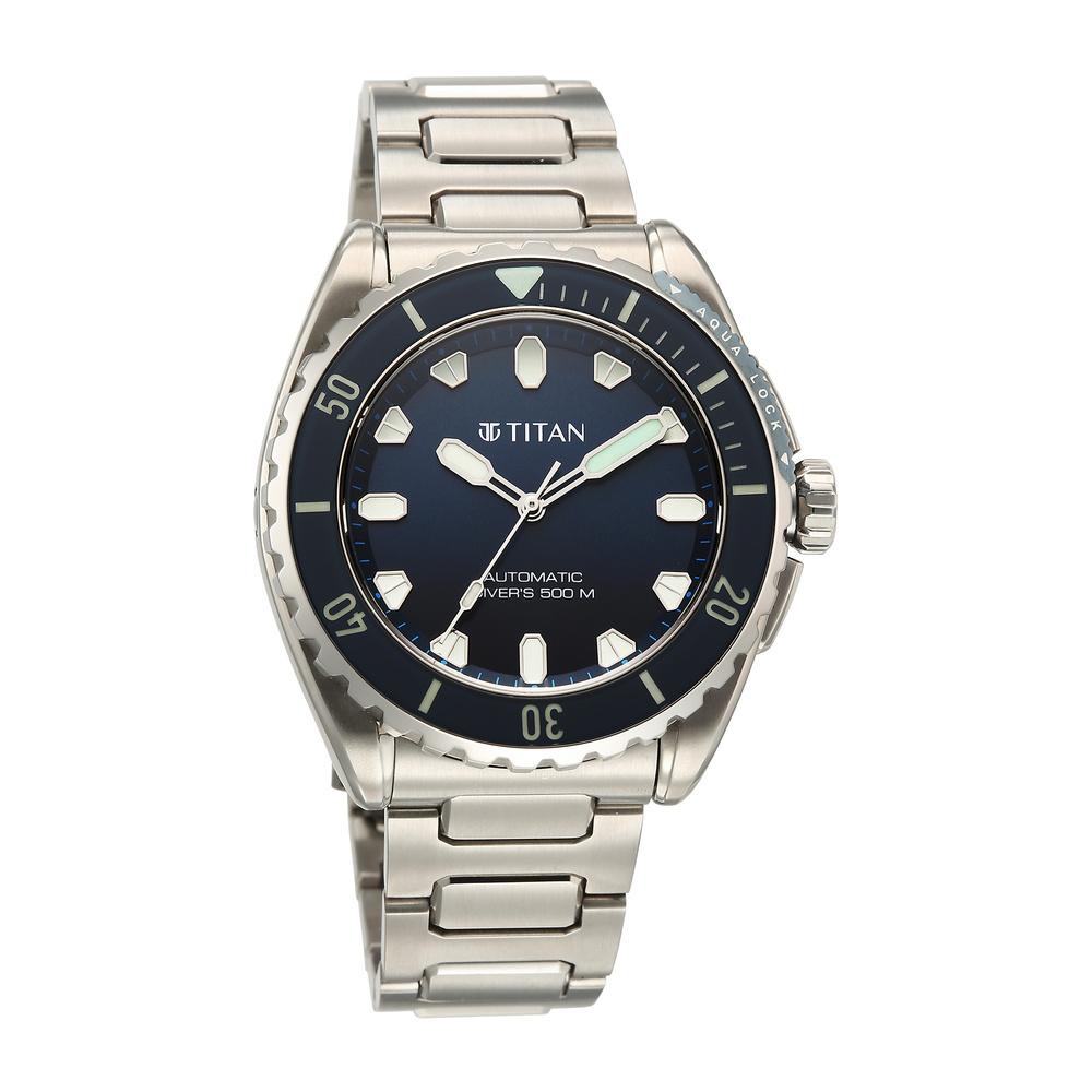 Titan watch with silver strap and blue dial on a white background