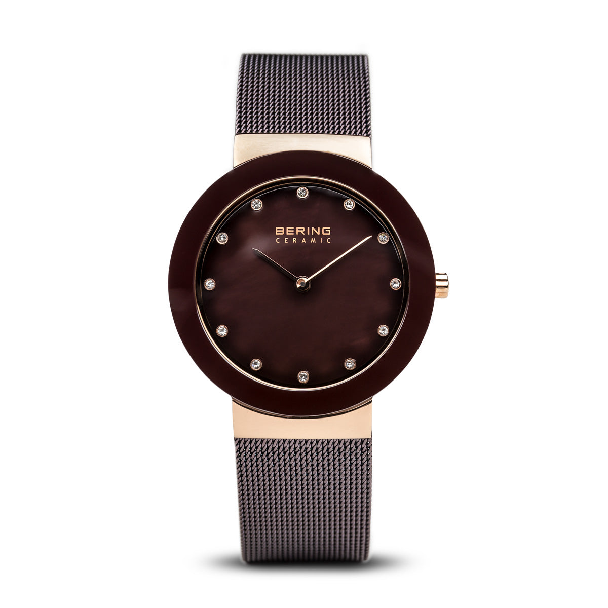 Watch with brown dial and rose gold accents on a white background