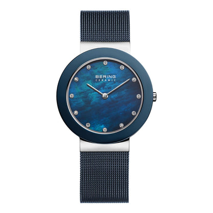 Blue watch with mesh band on a white background