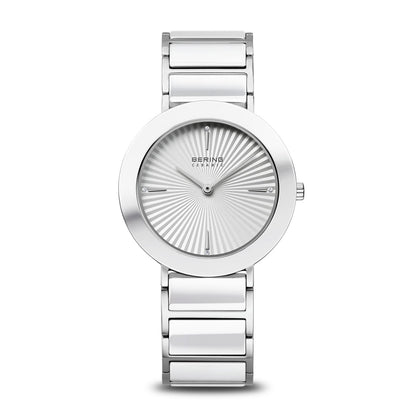 Silver watch with a white dial on a white background