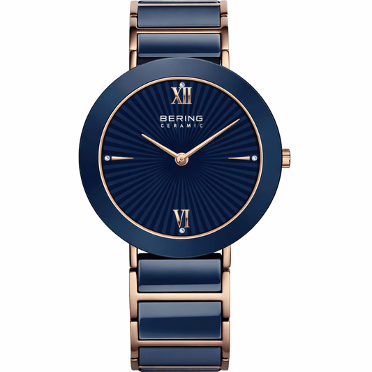 Blue and rose gold watch with Bering brand on a white background