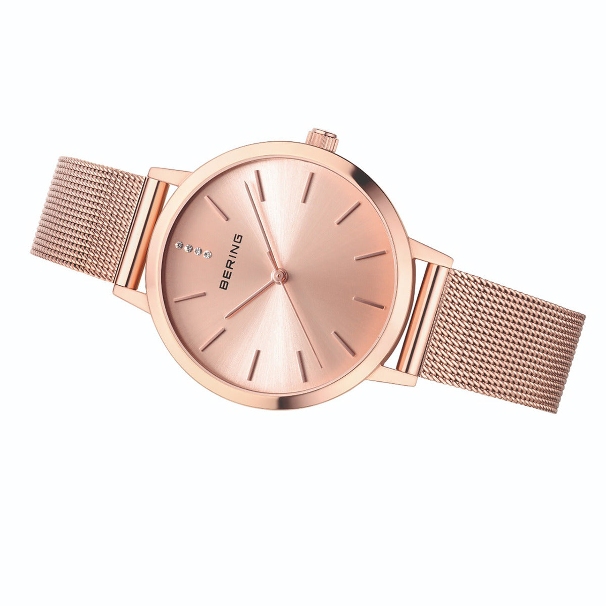 Rose gold watch with mesh band on a white background