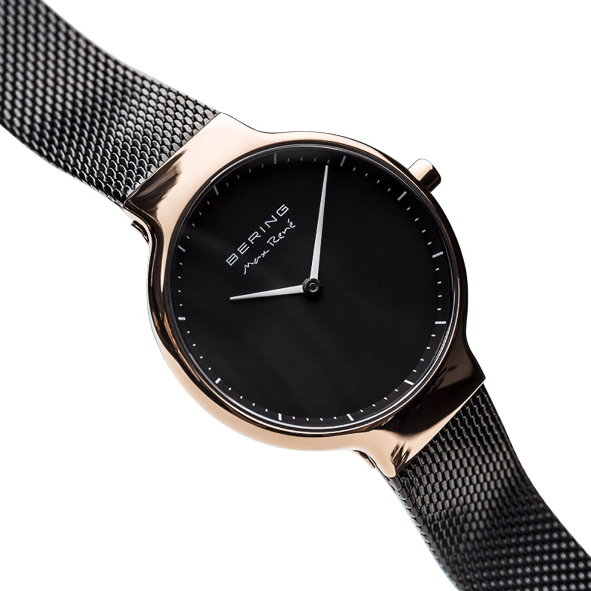 Black watch with rose gold bezel and mesh band on white background