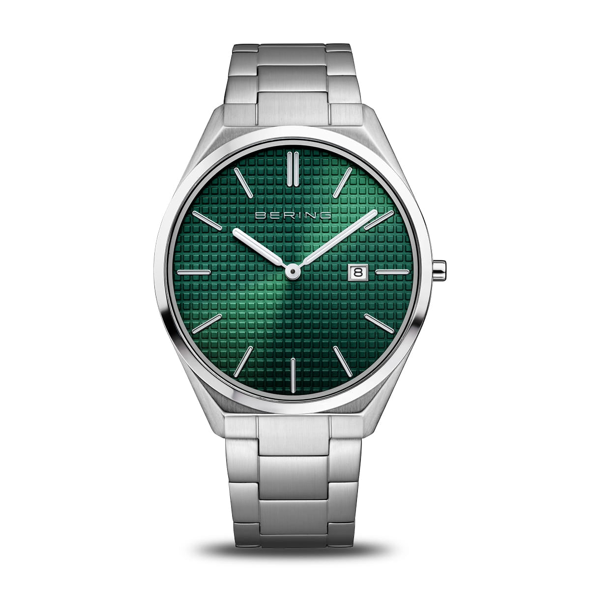 Silver watch with green dial on a white background