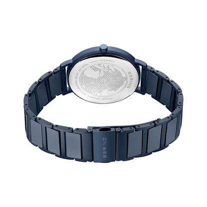 Blue watch with a detailed face on a white background