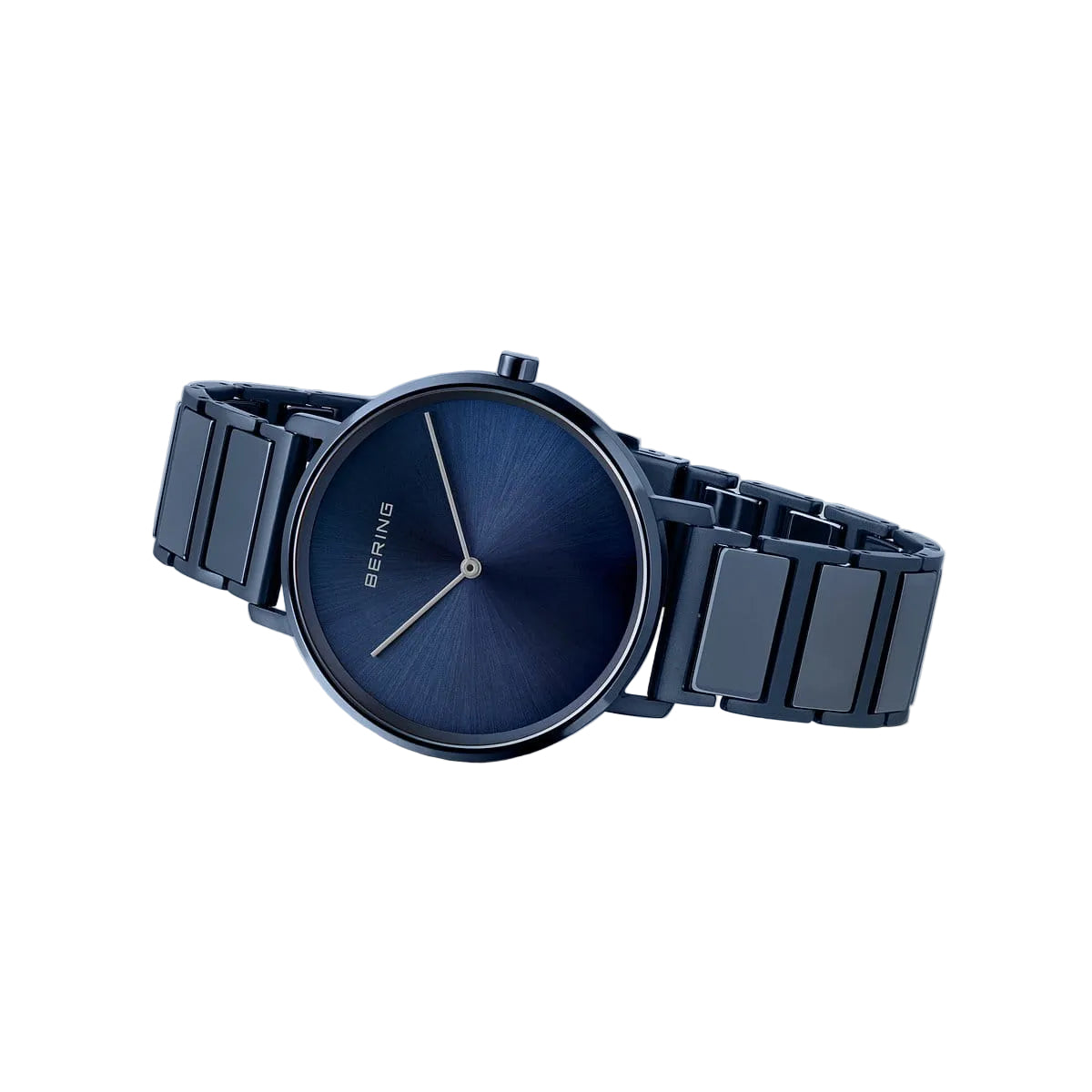 Blue watch with metal strap on a light gray background