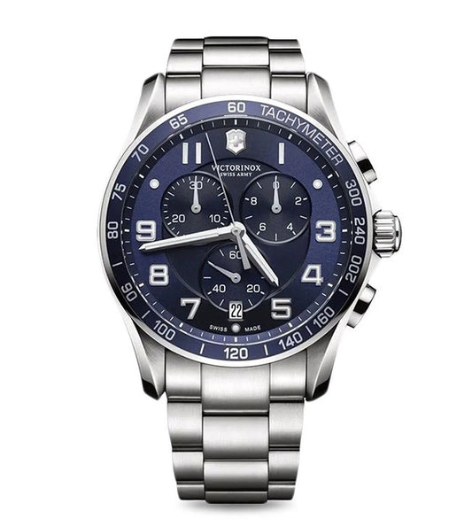 A silver-toned Victorinox analog chronograph watch with a blue dial, sapphire glass, and stainless steel bracelet with a deployment clasp.