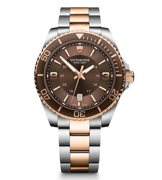 A Victorinox Maverick Swiss made watch for men with a brown dial, silver stainless steel bracelet, and a silver case.