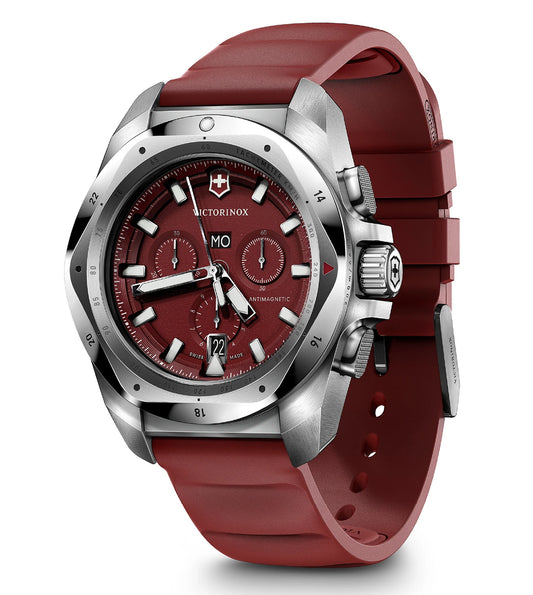 A red-colored VICTORINOX watch with a silver case and a rubber strap, featuring a dial with multiple subdials and a sapphire glass cover.