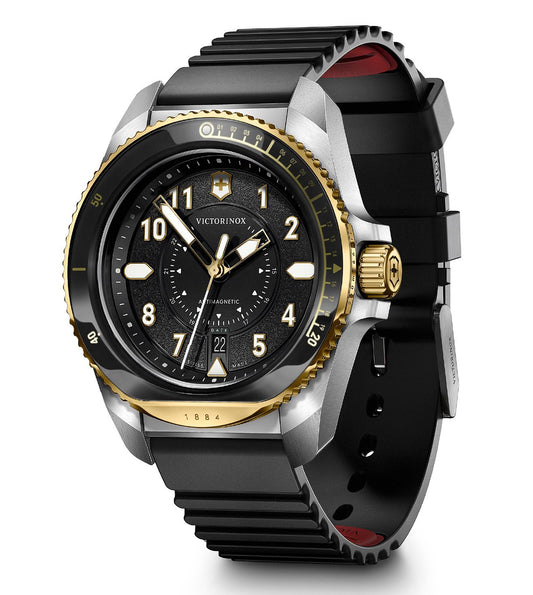 242014 Victorinox  A Journey 1884 Swiss made analog watch with a black dial, gold hands and a black rubber strap, featuring a sapphire glass cover and a gold case.