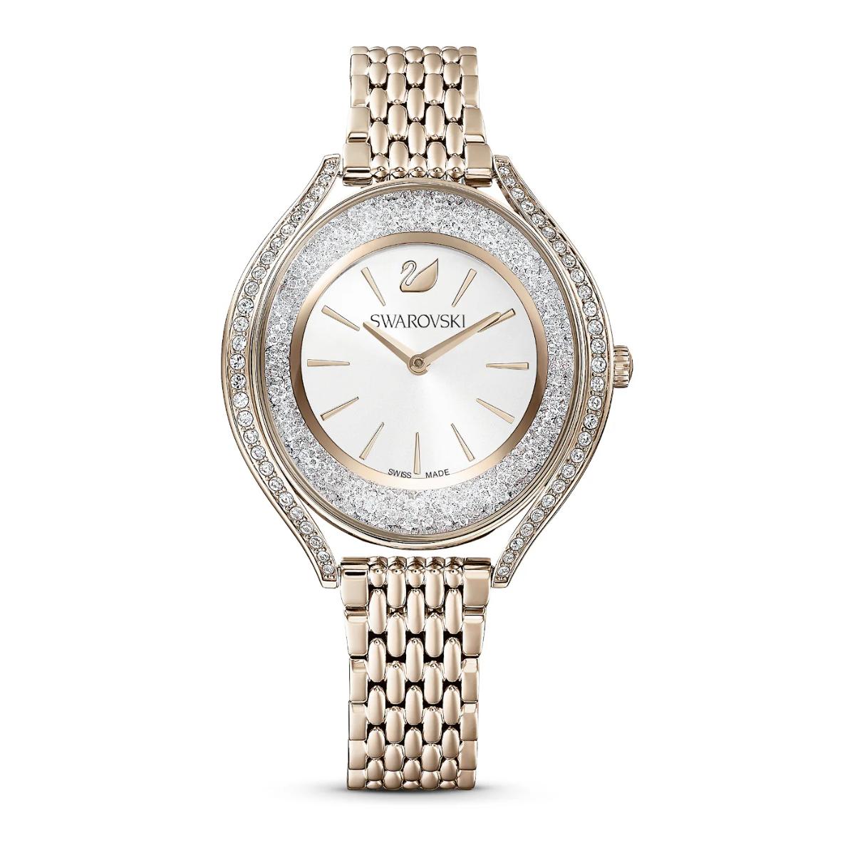 Swarovski watch with rose gold bracelet on a white background
