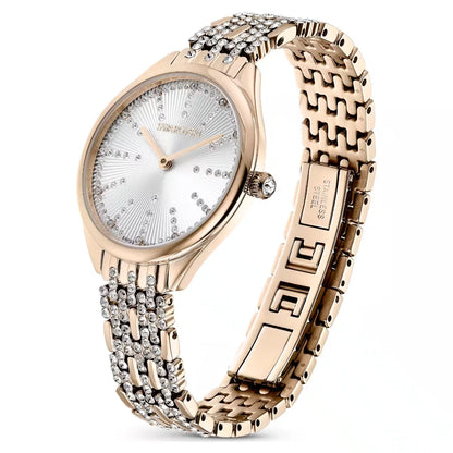Rose gold watch with intricate design on a white background