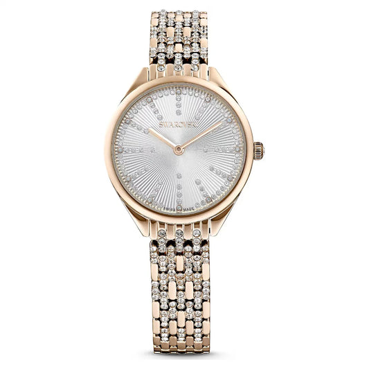 Rose gold watch with diamond-studded bracelet on a white background