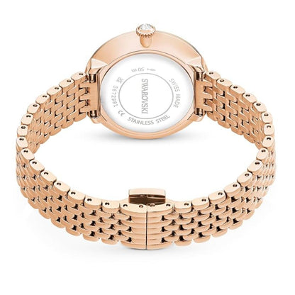 Rose gold watch with Swarovski branding on a white background