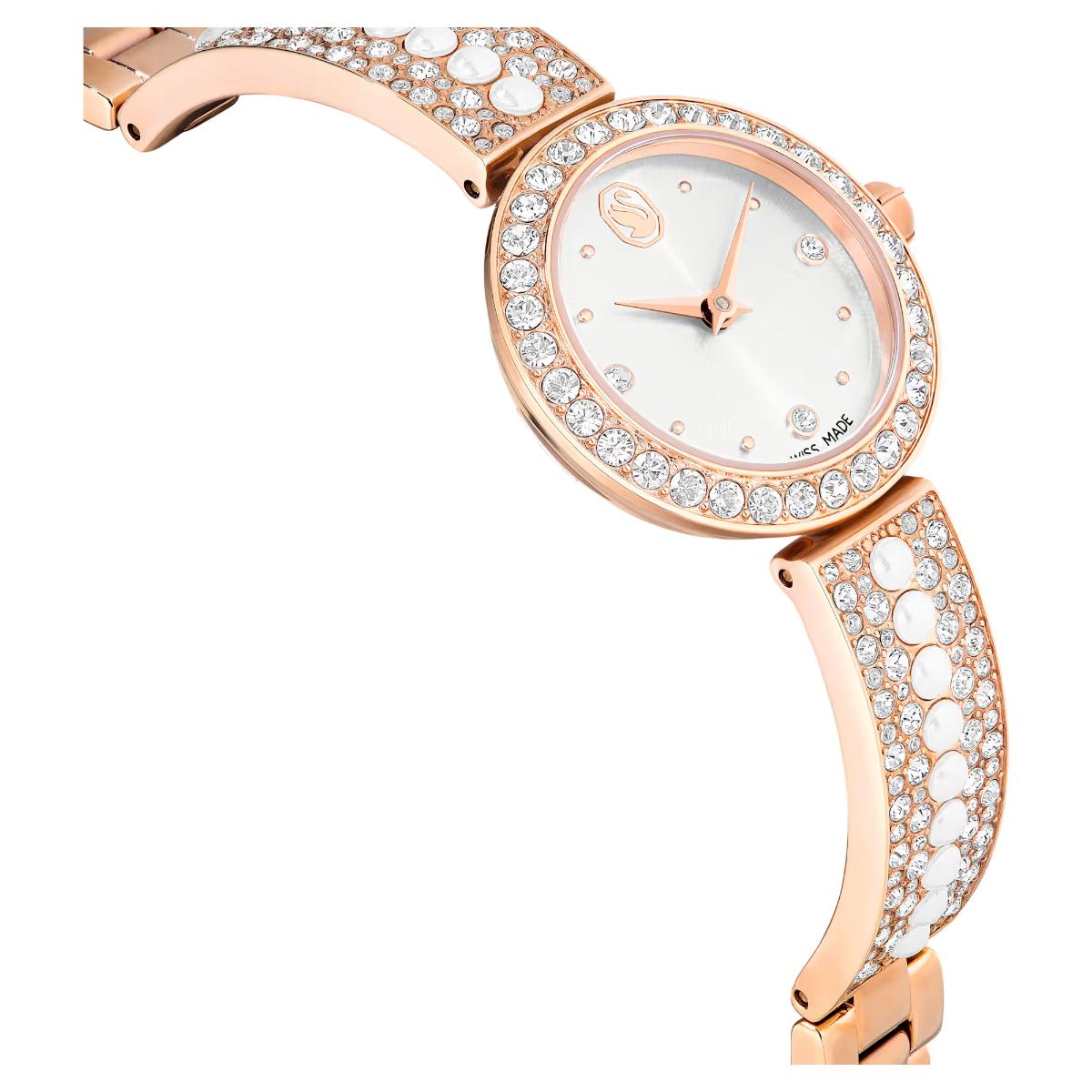 Rose gold watch with crystal embellishments on a white background