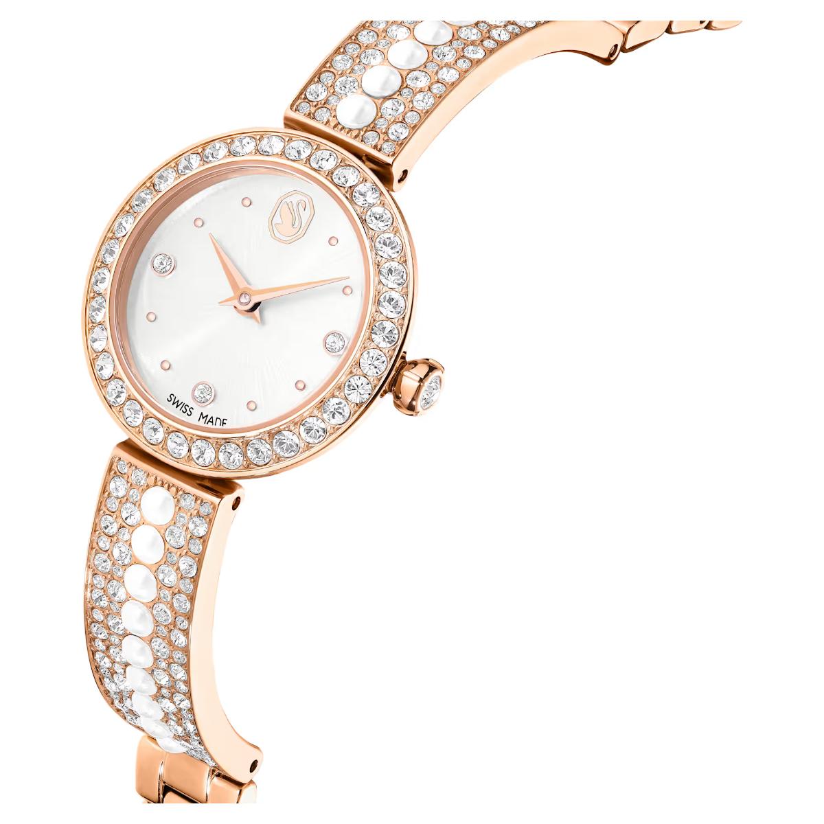 Rose gold watch with crystal embellishments on a white background