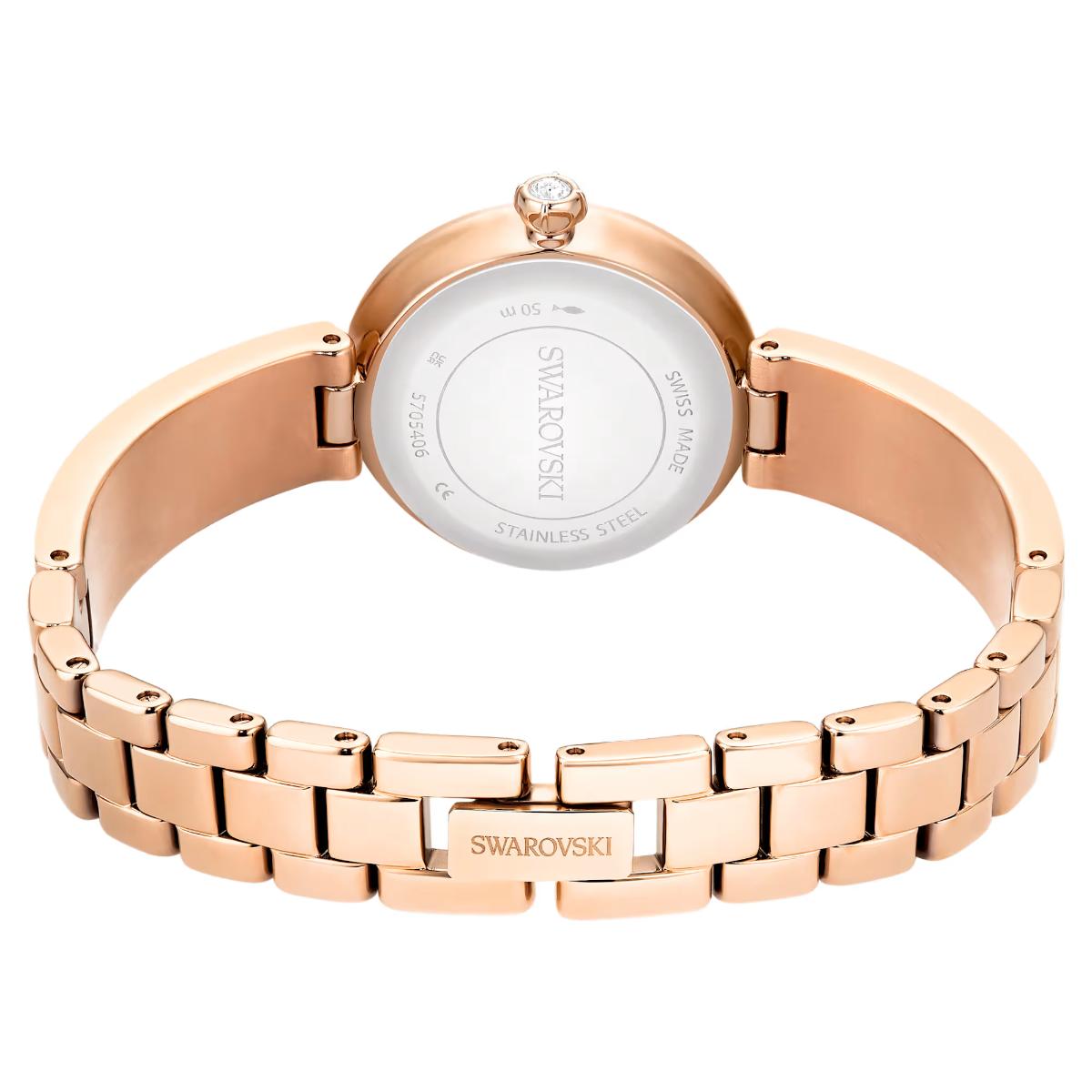 Rose gold Swarovski watch on a white background