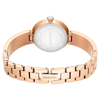 Rose gold Swarovski watch on a white background