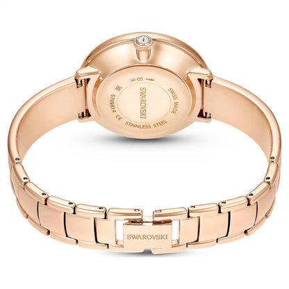 Rose gold Swarovski watch on a white background