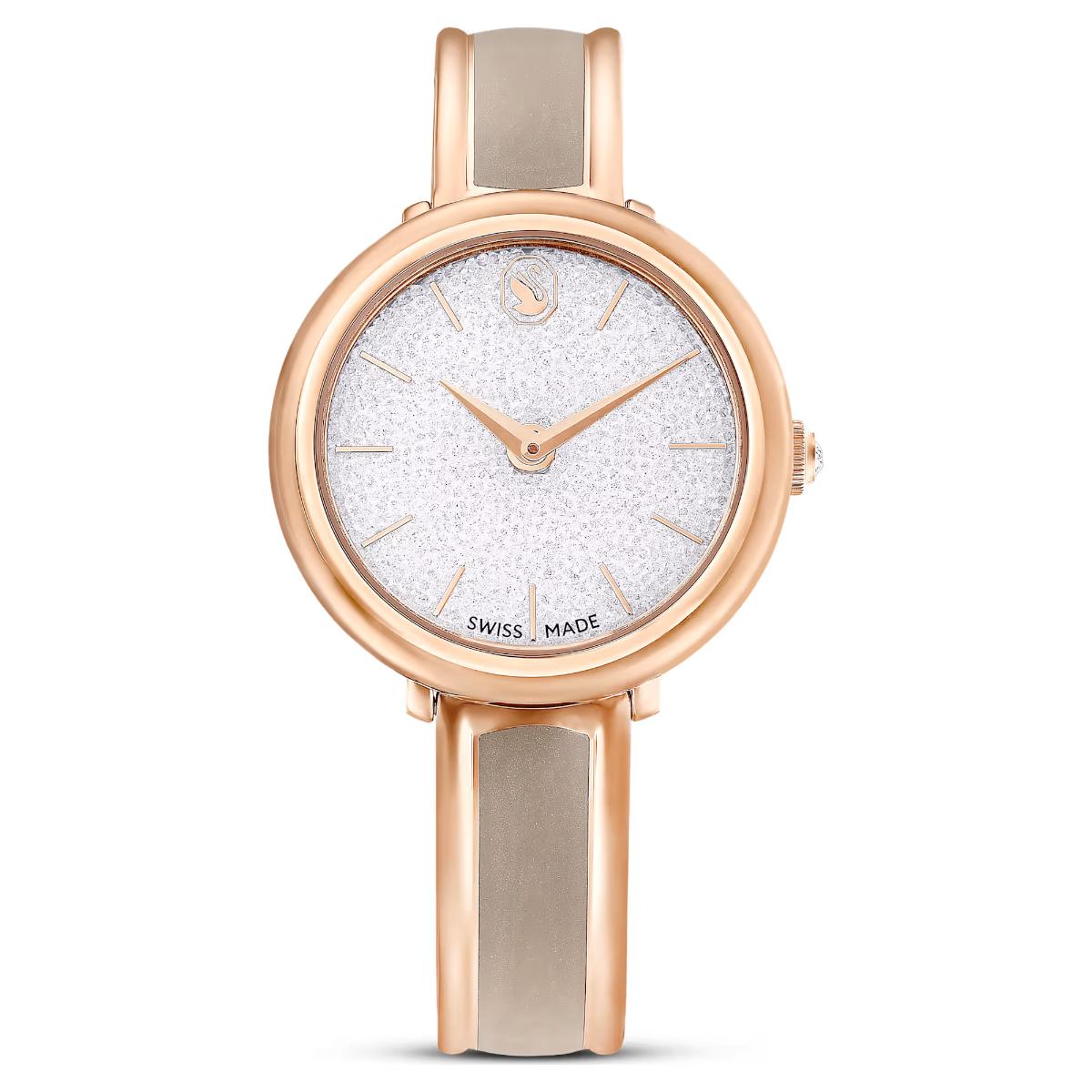 Wristwatch with rose gold case and silver band on a white background