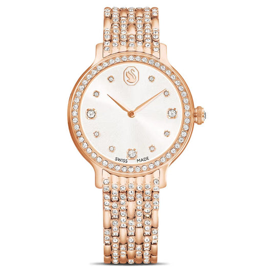 Rose gold watch with diamond-studded band on a white background