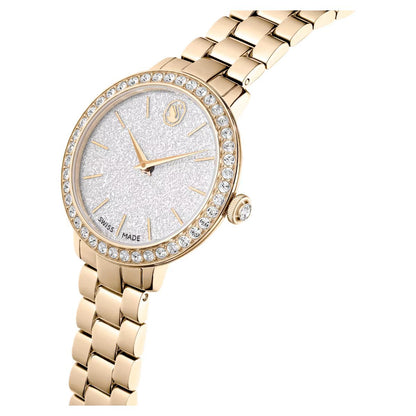 Gold wristwatch with diamond-studded bezel on a white background