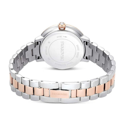 Swarovski watch with two-tone rose gold and silver bracelet on a white background