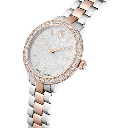 Luxury watch with silver and rose gold band on a white background