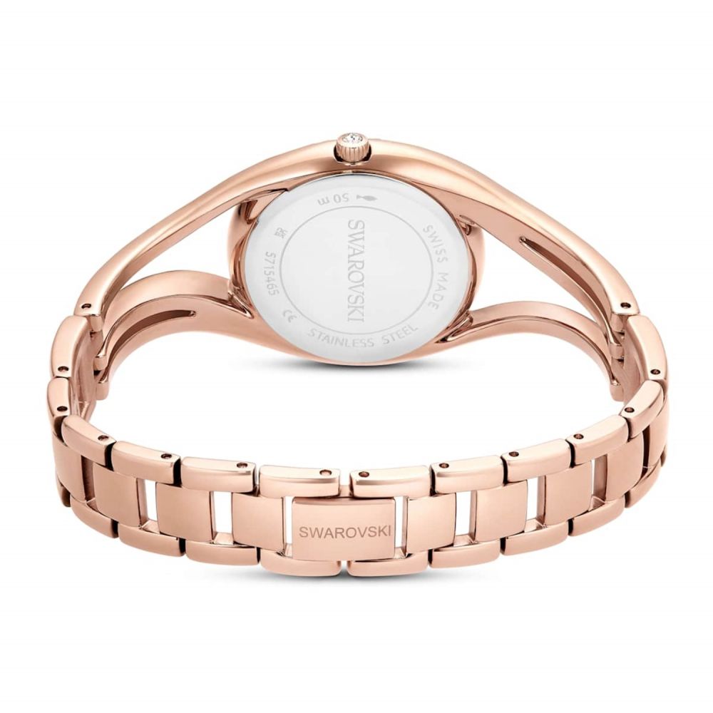 Rose gold Swarovski watch on a white background