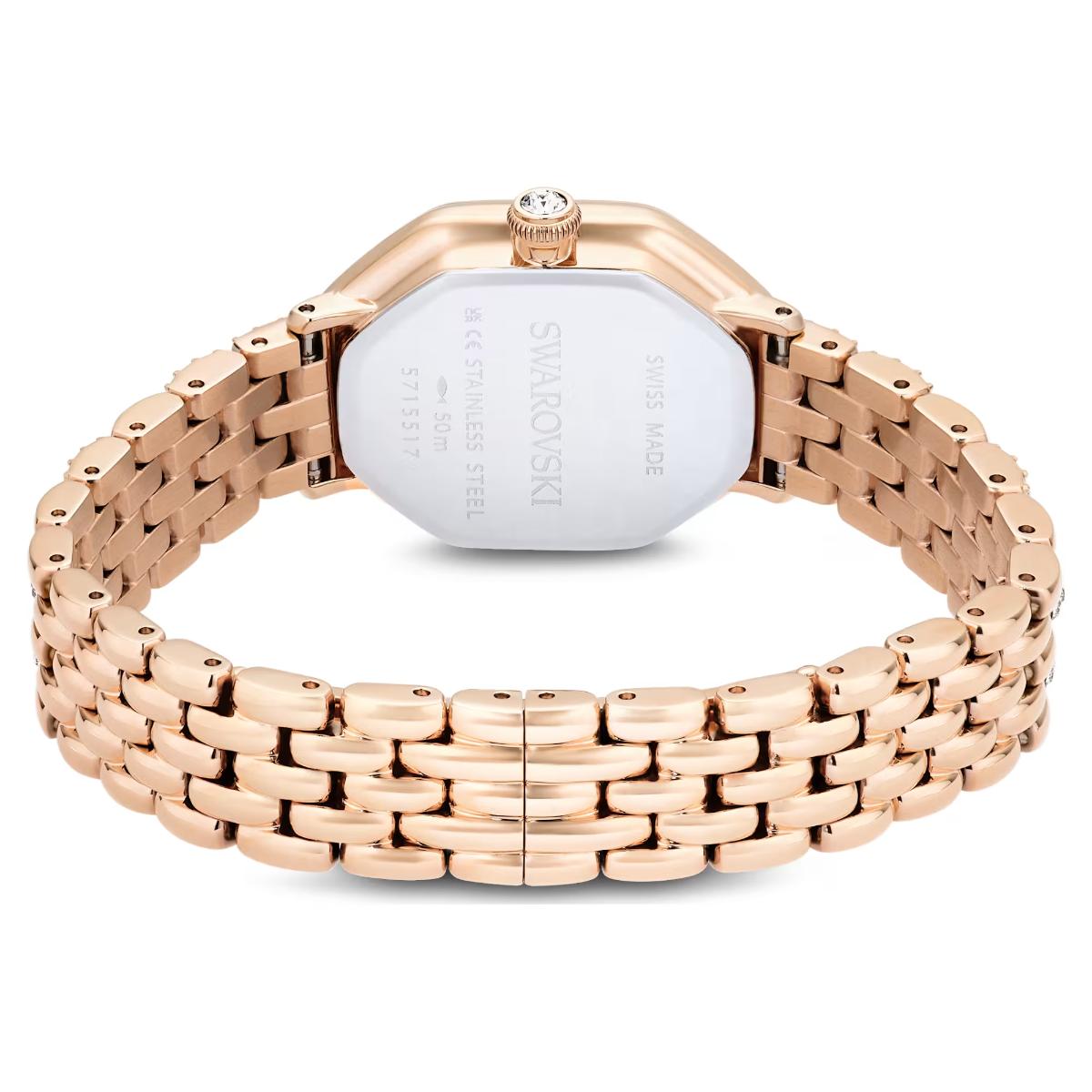 Rose gold watch with a white face on a white background