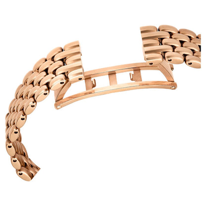 Rose gold watch strap on a white background