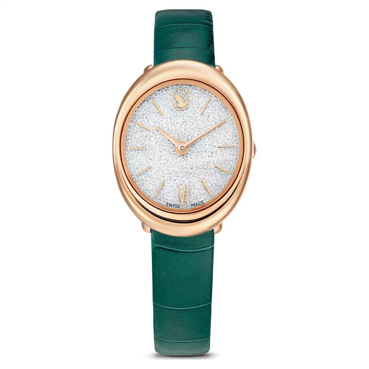 Watch with green strap and rose gold case on white background