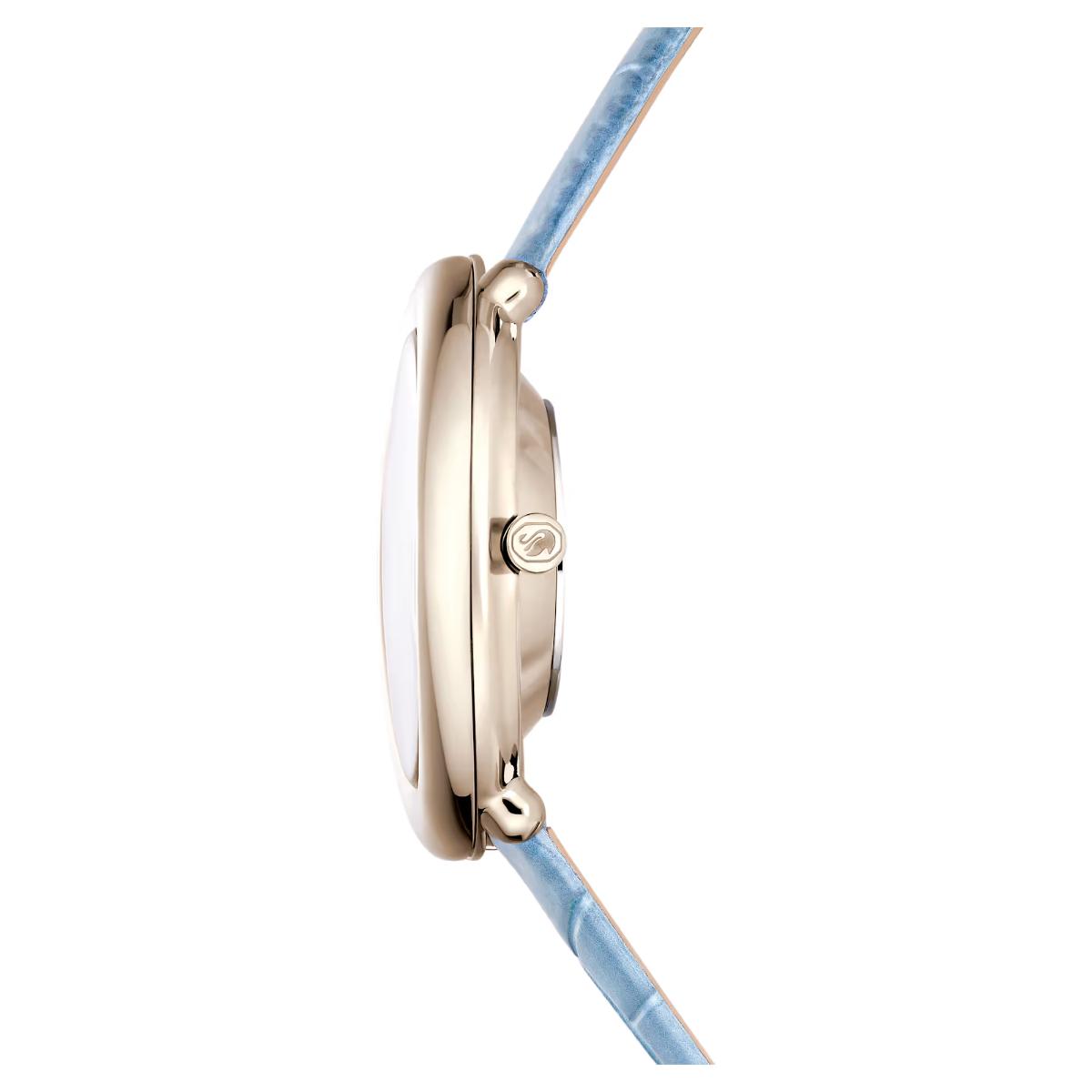 Close-up of a watch with a blue strap on a white background