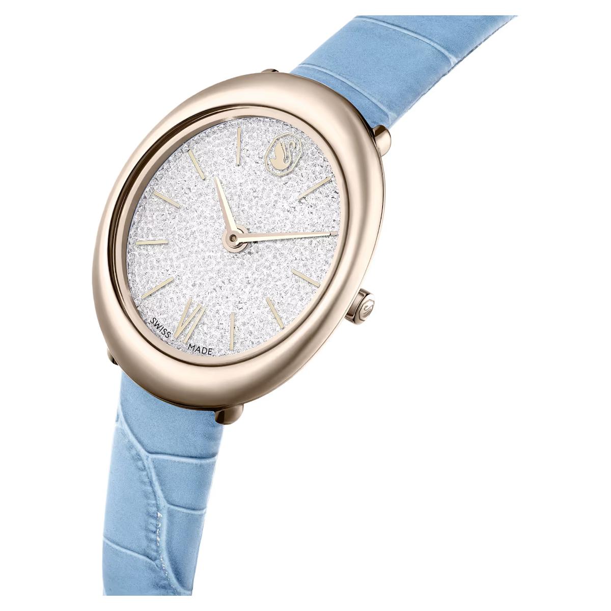 Wristwatch with rose gold case and light blue strap on a white background