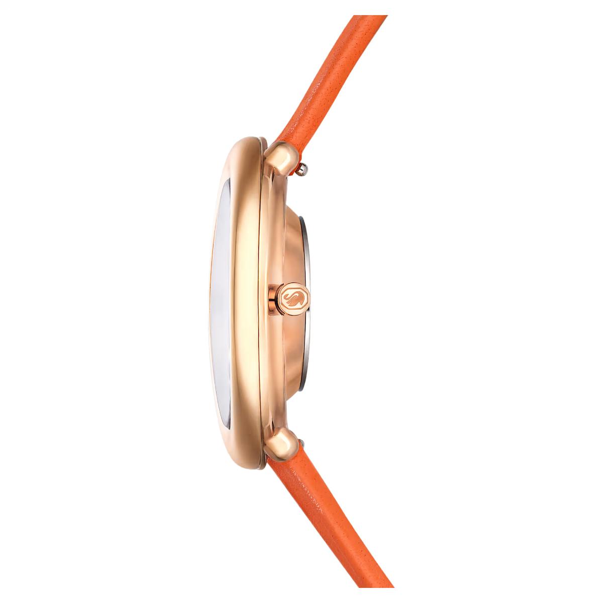 Wristwatch with rose gold case and orange strap on a white background