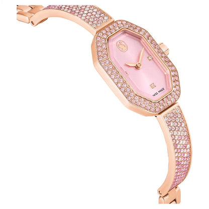 Rose gold watch with pink face and bracelet on a white background