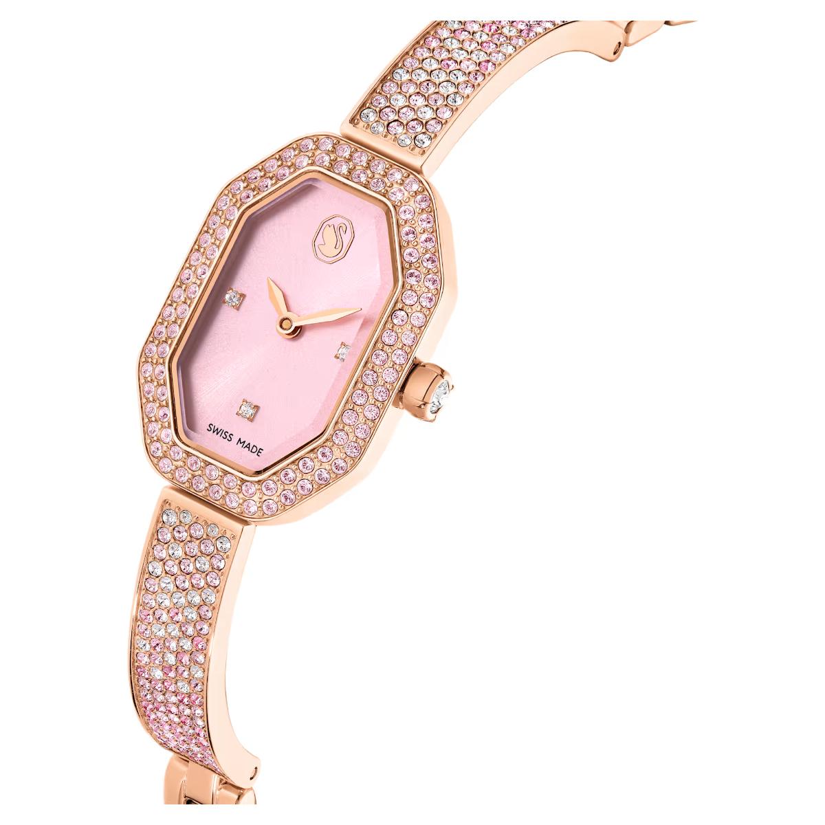 Luxury watch with pink face and rose gold case on a white background
