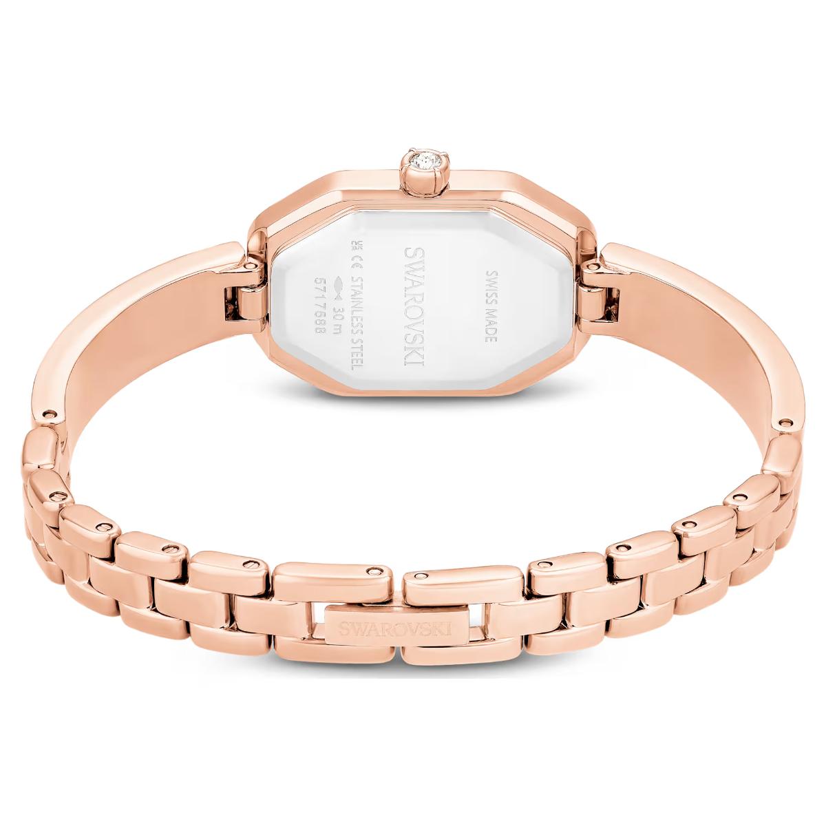 Rose gold watch with a white face on a white background