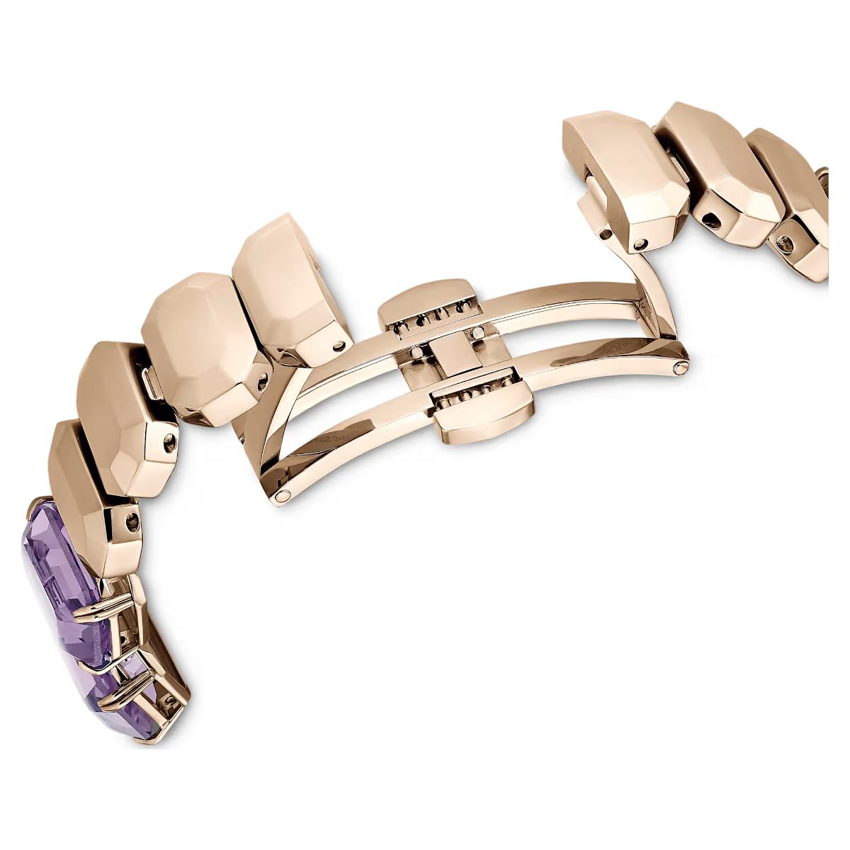 Rose gold bracelet with purple gemstones on a white background