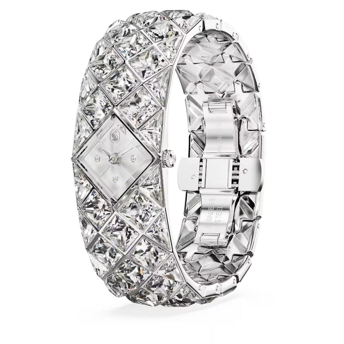 Silver bracelet with diamond-like crystals on a white background