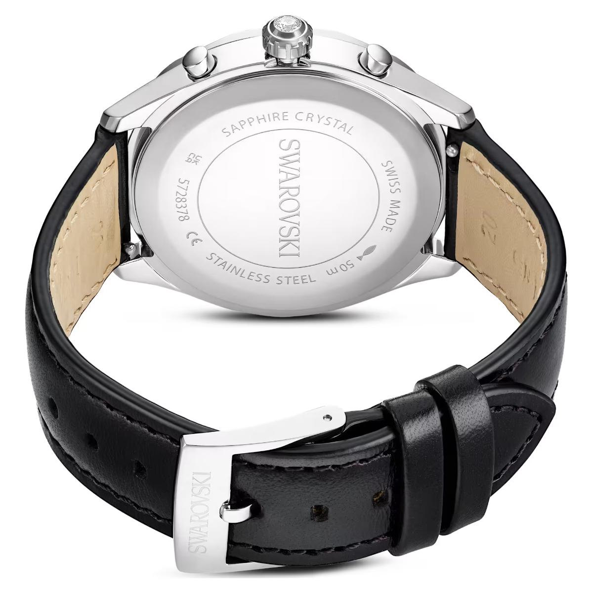 Swarovski watch with black leather strap and silver case on a white background