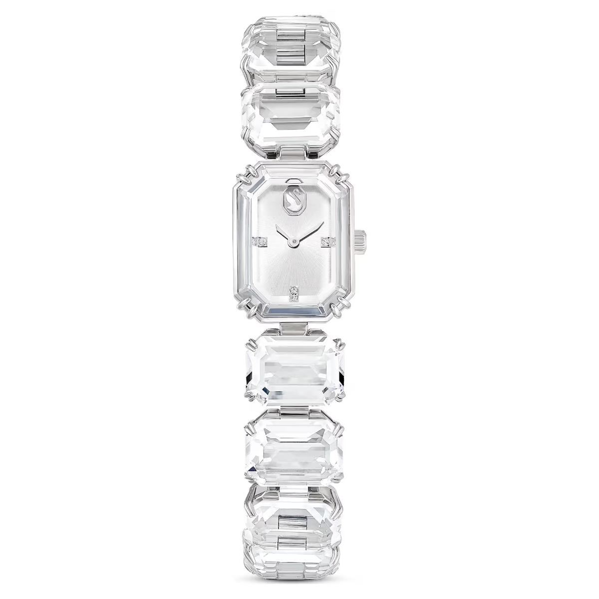 Silver watch with emerald-cut gemstones on a white background