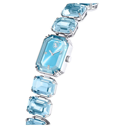 Luxury watch with blue gemstones on a white background